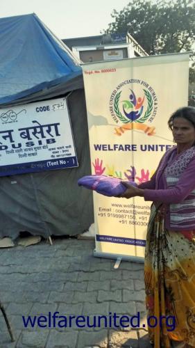 woolen clothes distributed near aiims delhi