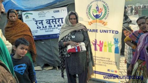 woolen clothes distributed near aiims delhi